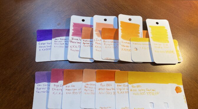 Two rows of sample cards, starting with purple, then magenta, oranges, and yellows.